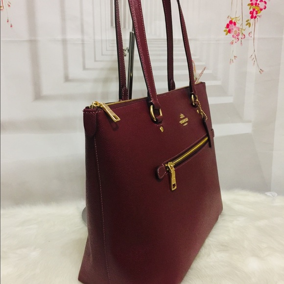 coach wine colored bag